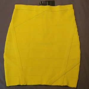Bebe Vibrant yellow mini bandage skirt.